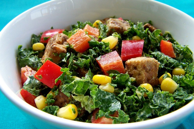 Kale salade with tahini-miso dressing and baked tofu