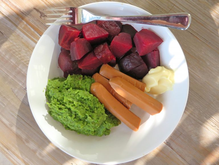 Beets, vegan sausage and mushy peas